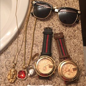 Versace belts and Gucci watches